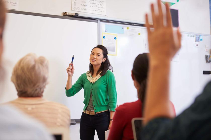 Image of raised hands - What to Expect from IH Erasmus+